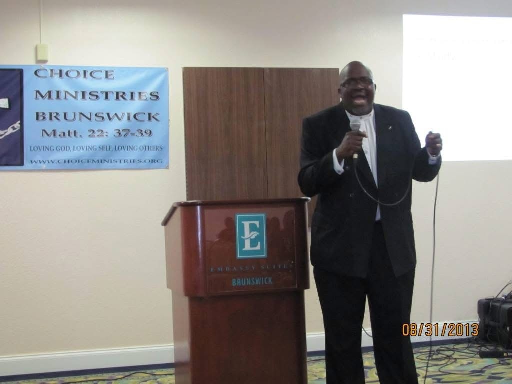 Choice Ministries Brunswick – pastor speaking at podium
