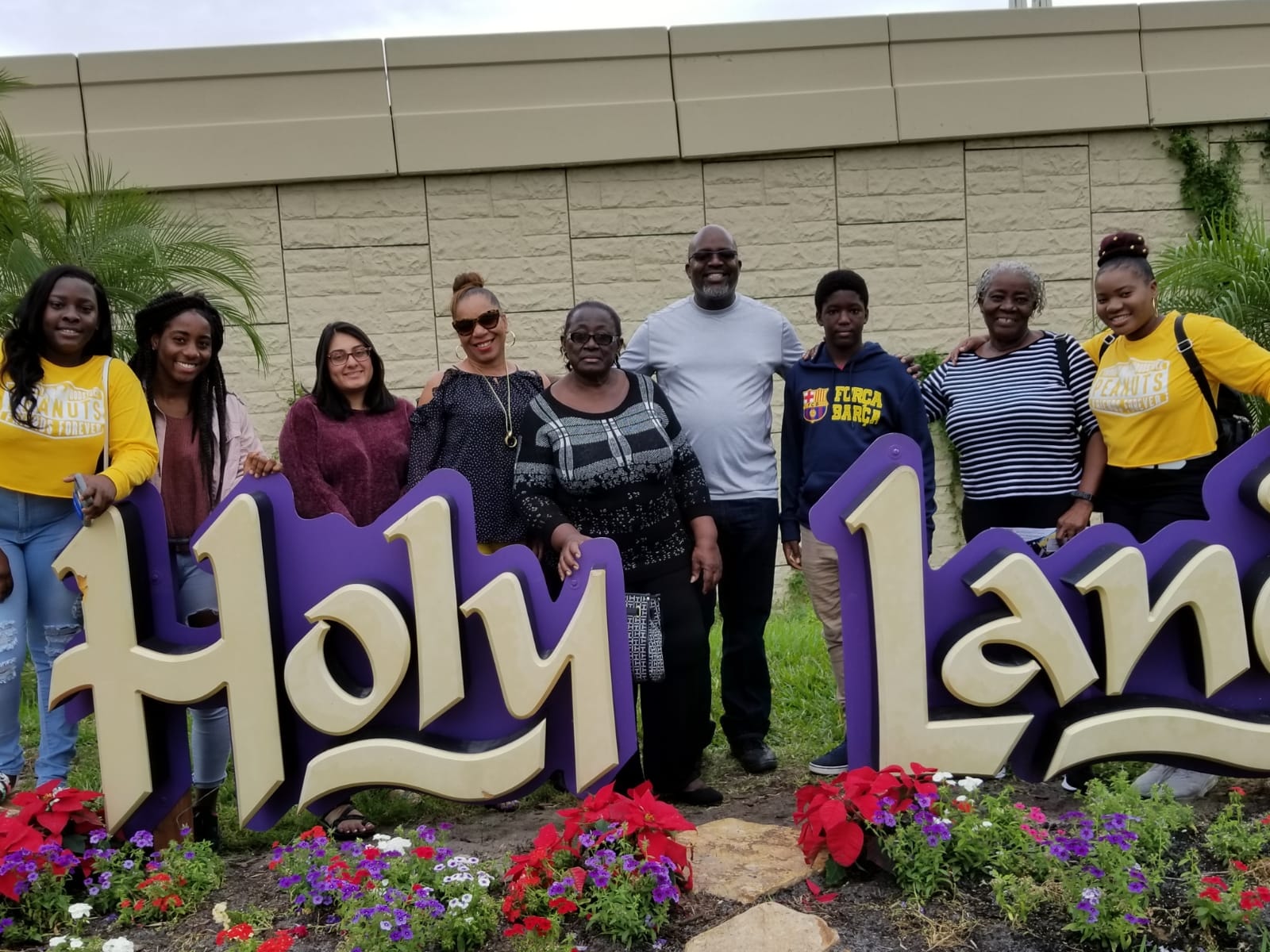 Choice Ministries Brunswick – group at Holy Land sign