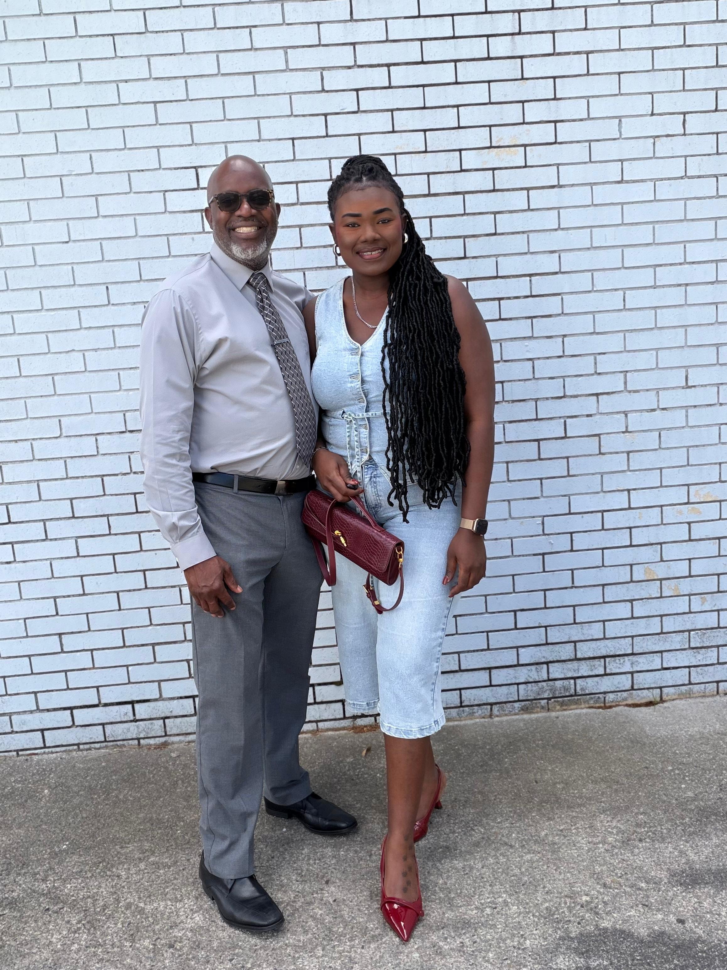 Choice Ministries Brunswick – two members outside against brick wall